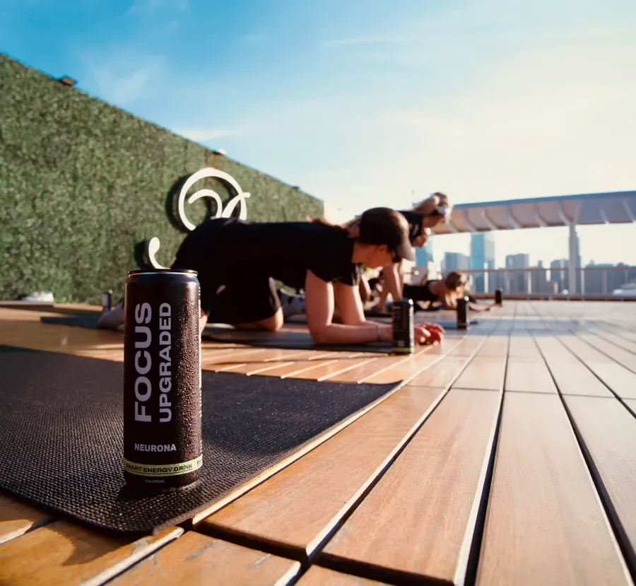 Participants holding a plank during class