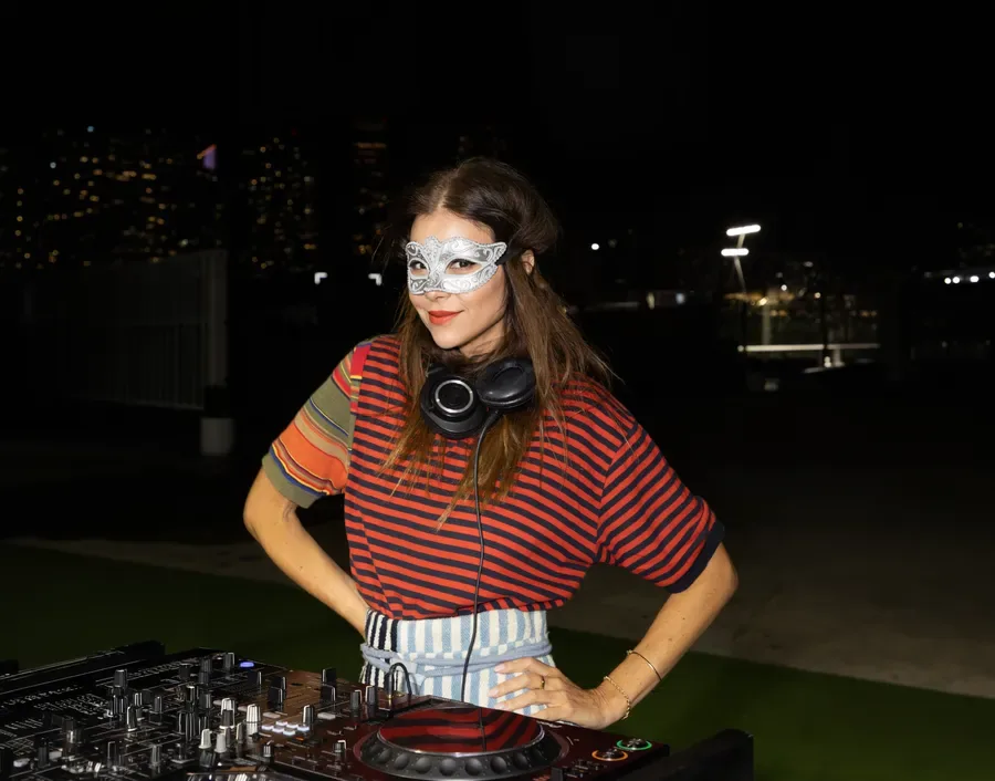 A masked DJ at the Halloween event
