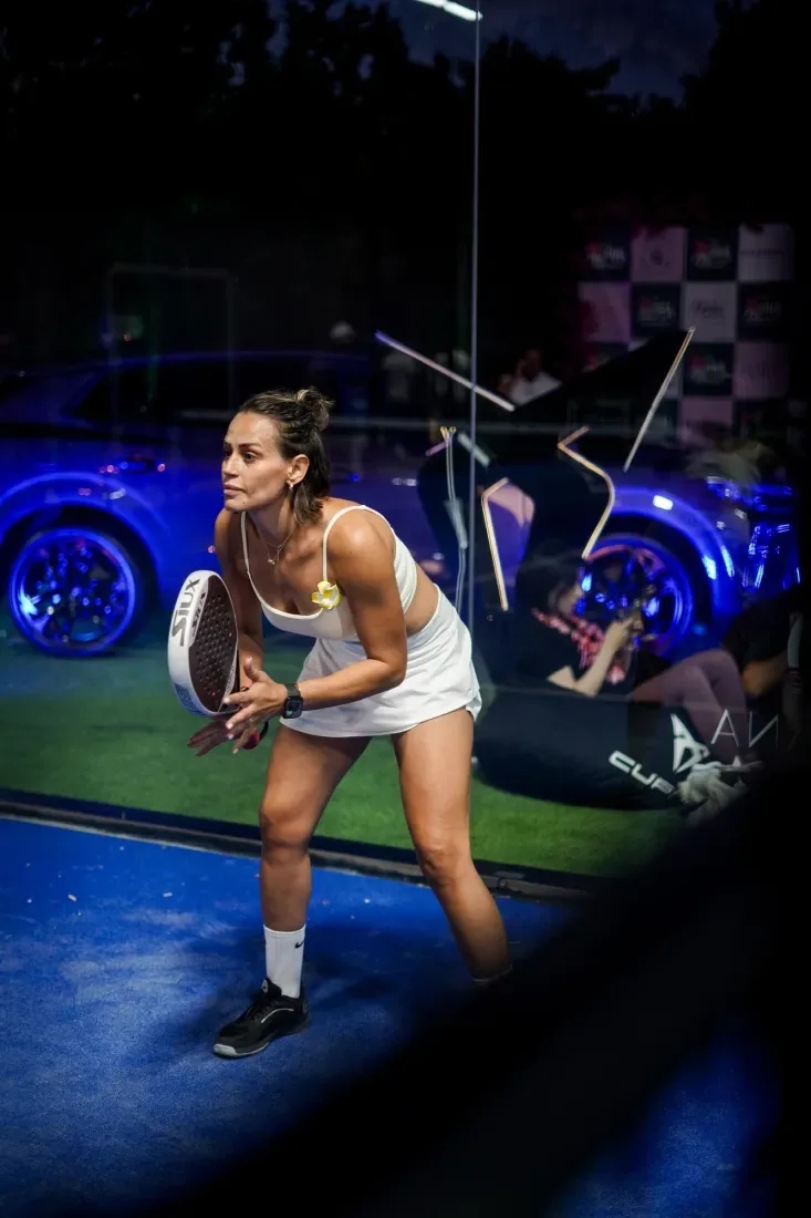 A player preparing for a rally at night
